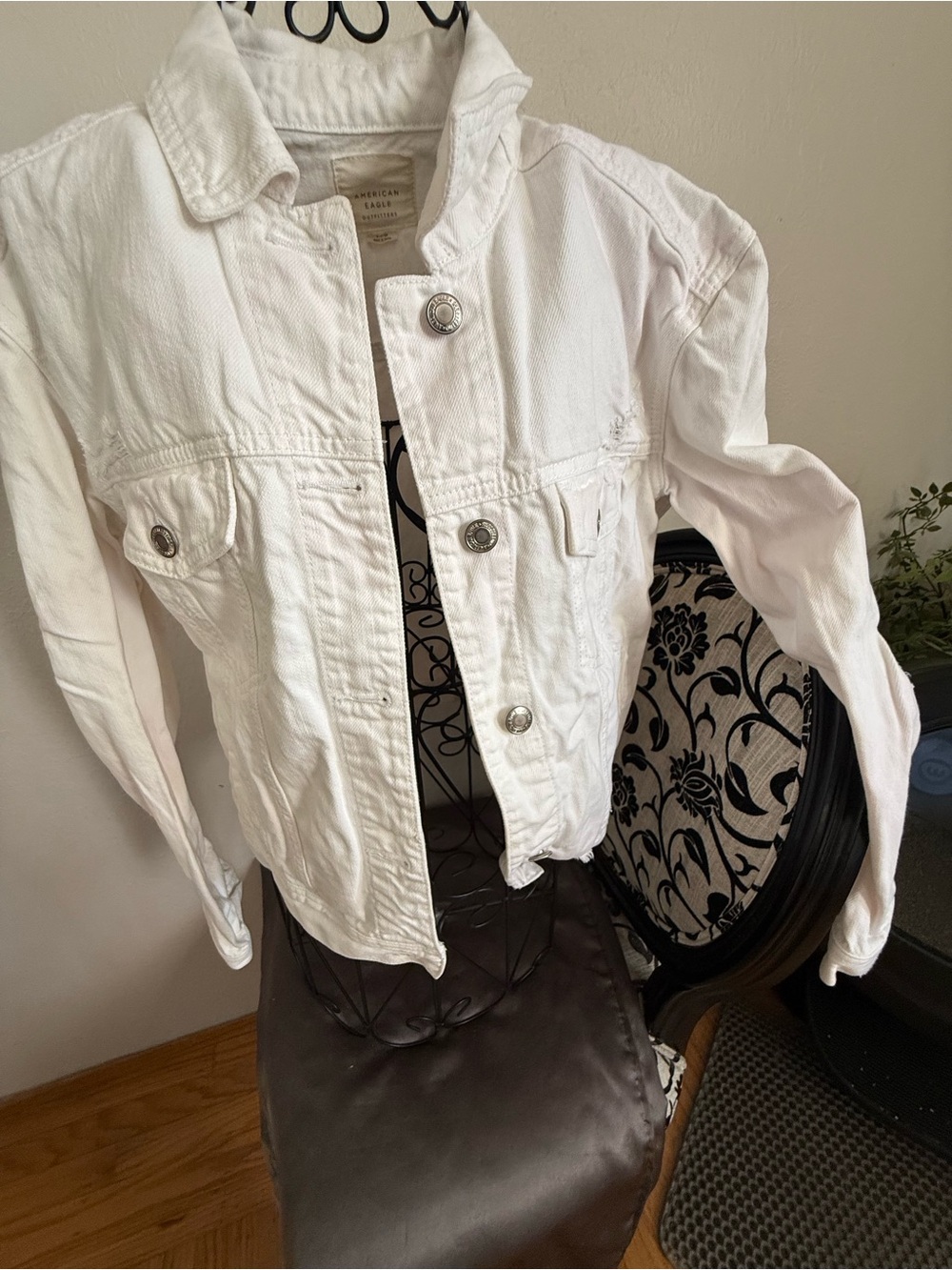 American Eagle Outfitters Women’s Distressed White Denim Trucker Jacket